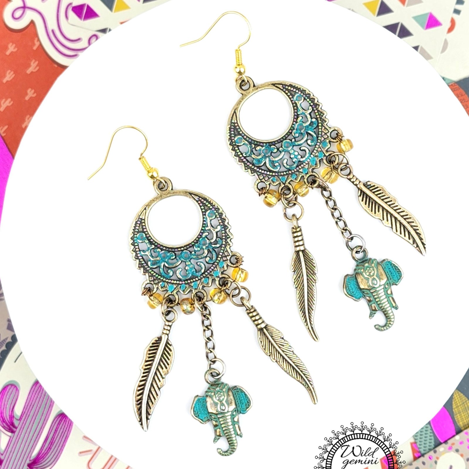 Boho Elephant & Feather Earrings โ Handmade Tribal Dangle Jewelry with Turquoise Brass Charms, Yellow Seed Beads & Floral Gold Hoops
