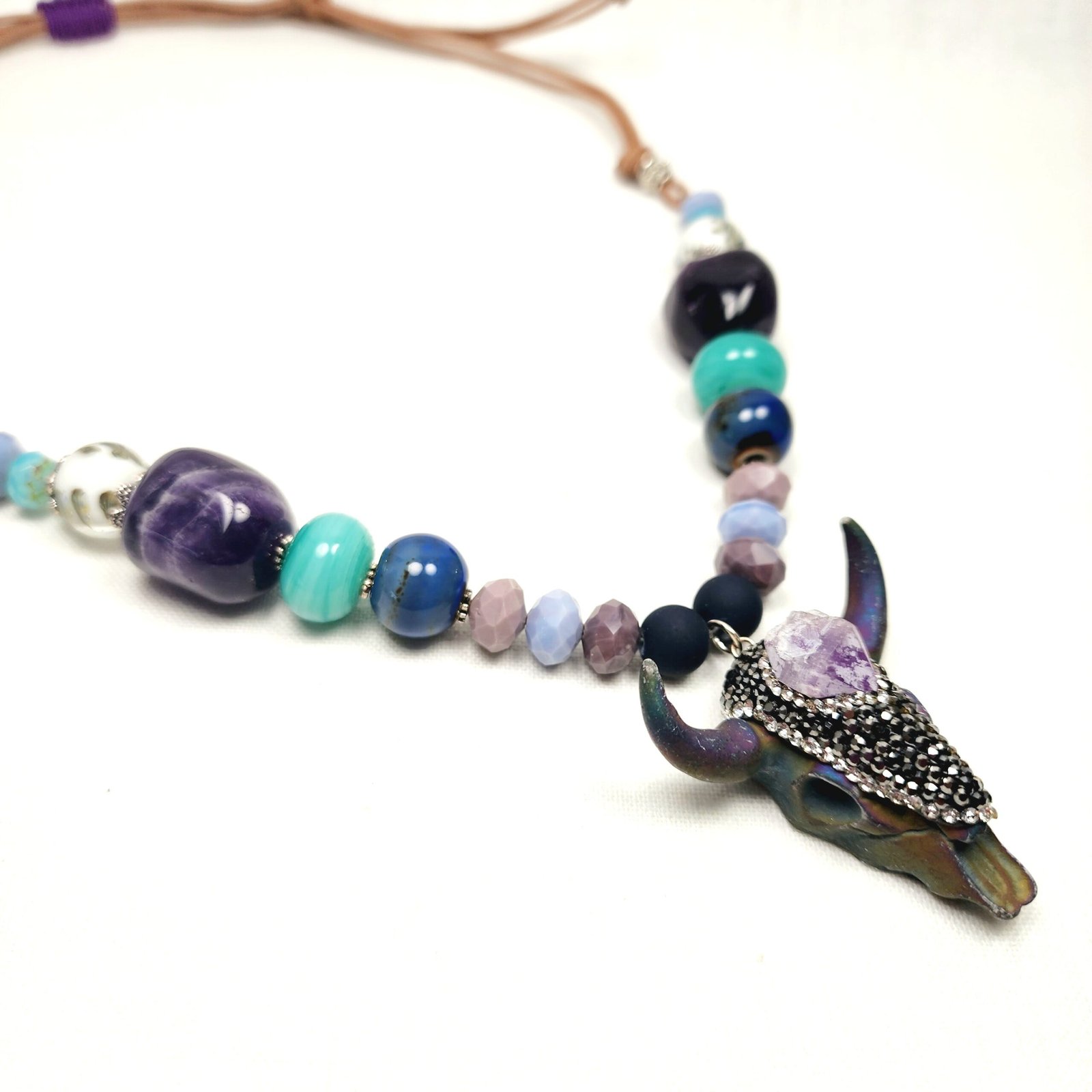 Boho Bull Skull Necklace โ Handmade Rustic Jewelry with Amethyst Nuggets, Teal Lampwork Beads on Adjustable Leather Cord